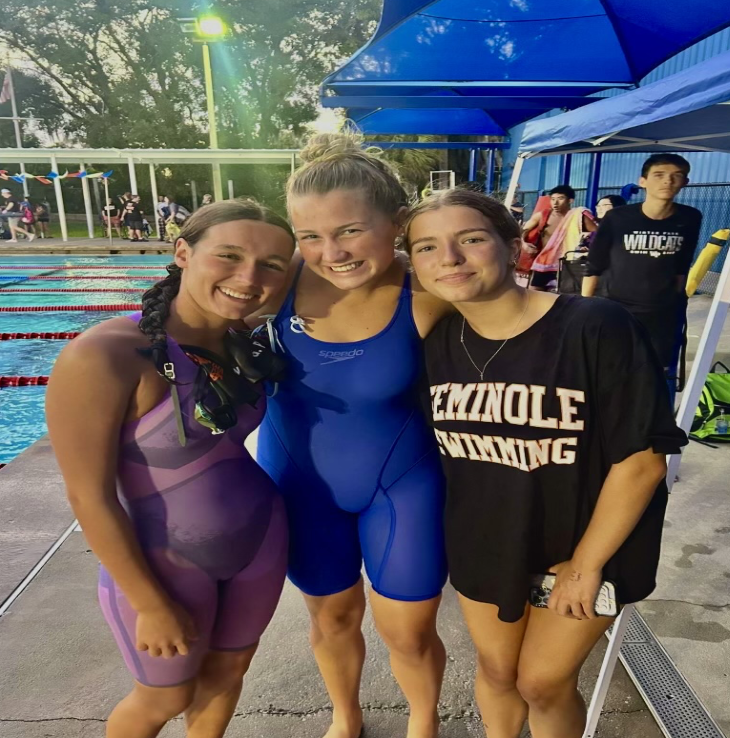 Seminole High swimmers Julia Pando and Gabriella Pierson with a friend at the swim meet. 